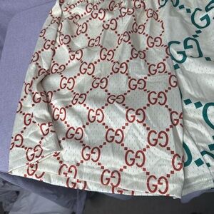 Gucci White Athletic Shorts with Red GG Monogram and Teal Accent
